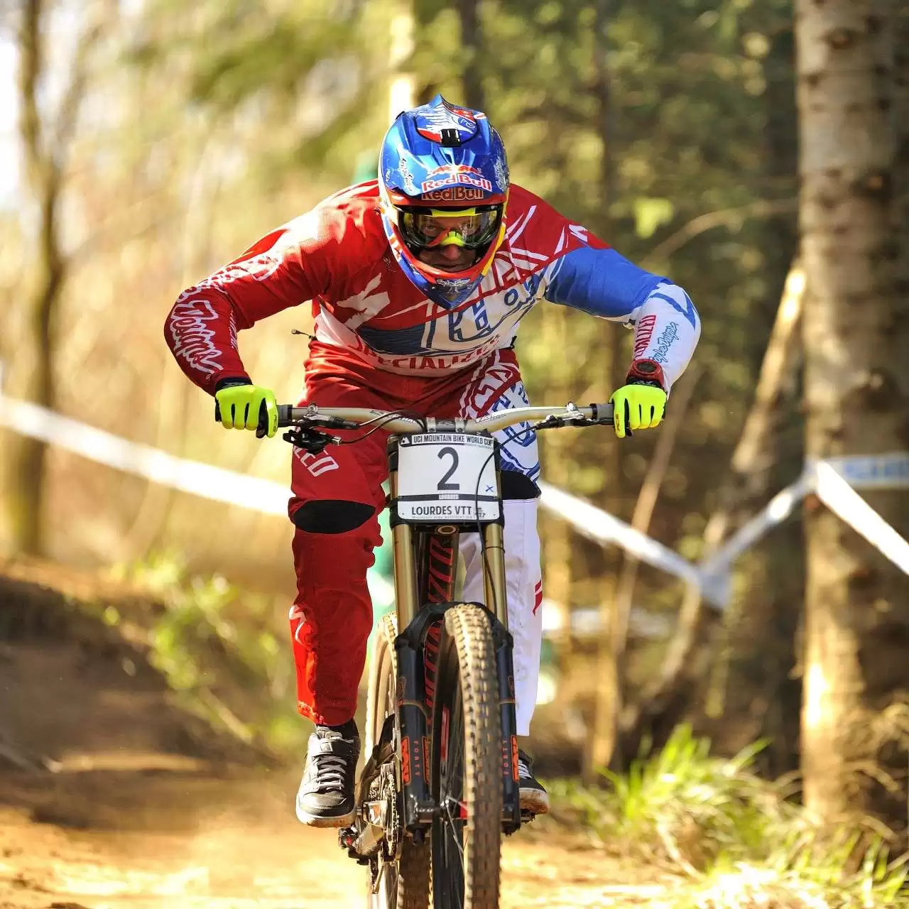 Aaron Gwin in a hinged-at-the-hips-flat-back riding position